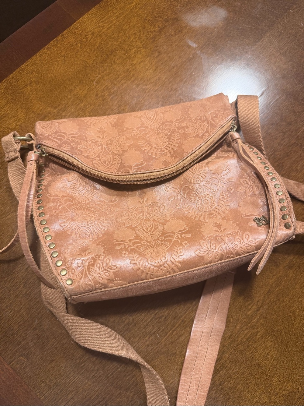 The SAK Embossed Floral Crossbody Bag in Dusty Rose